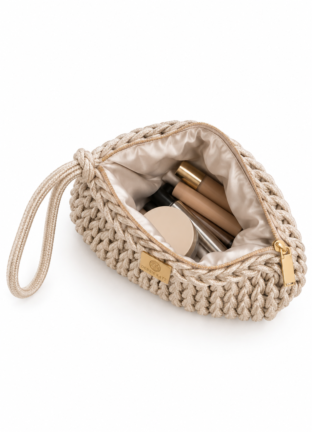 Bardot Crochet Clutch in Champagne. Open lined interior.