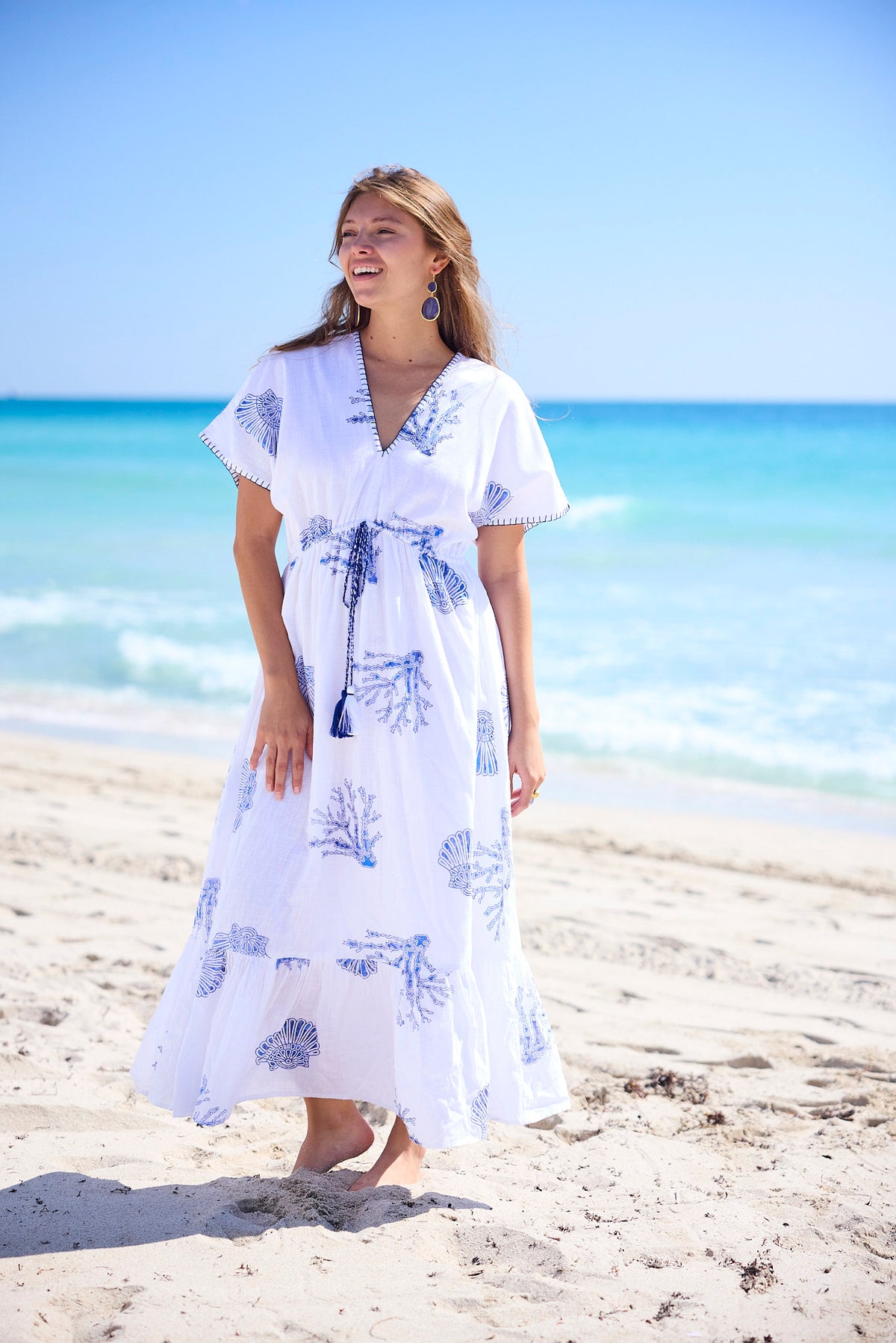 Jayla Maxi Dress. Angled view of seashell motifs.