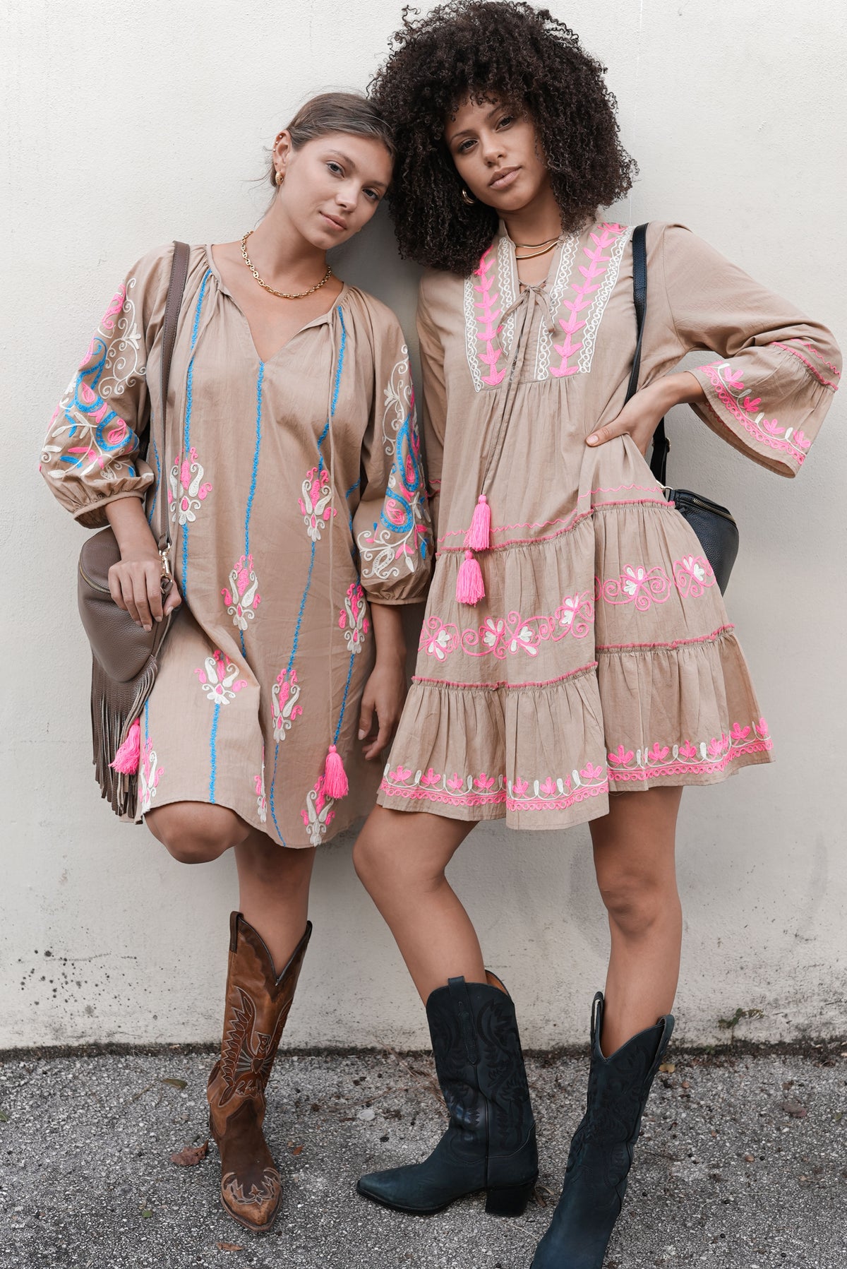 Kady Embroidered Mini Dress in Taupe. Kady shown on the right beside a model wearing a different dress.