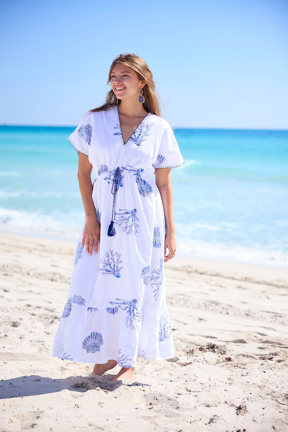 Jayla Maxi Dress. Full-length view on a model at the beach.