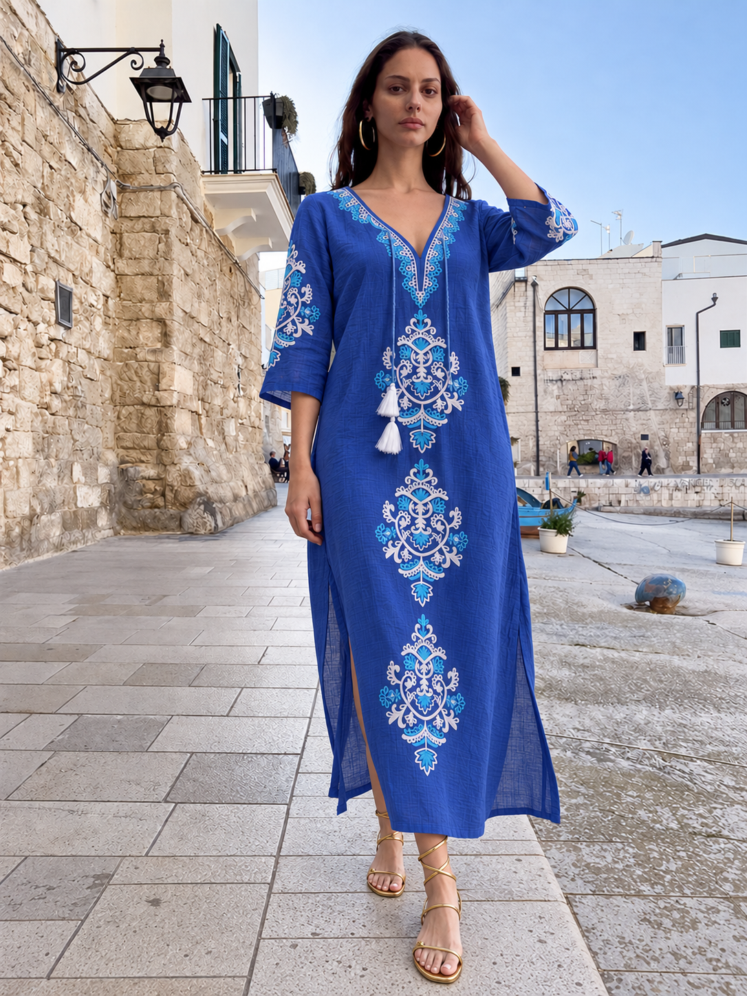 Moni Maxi Tunic Navy — navy embroidered maxi tunic, front view on the quay